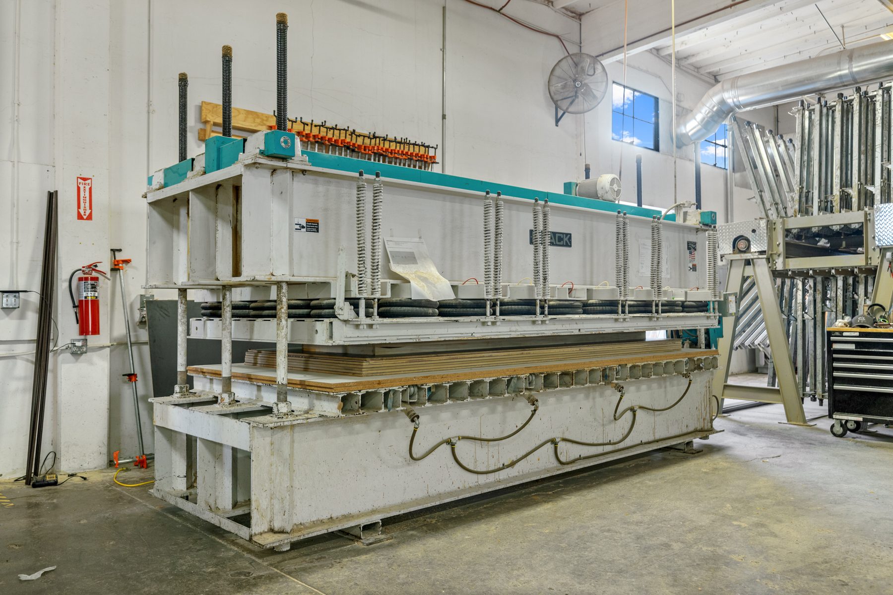 The veneer press on Fine Line's shop floor.