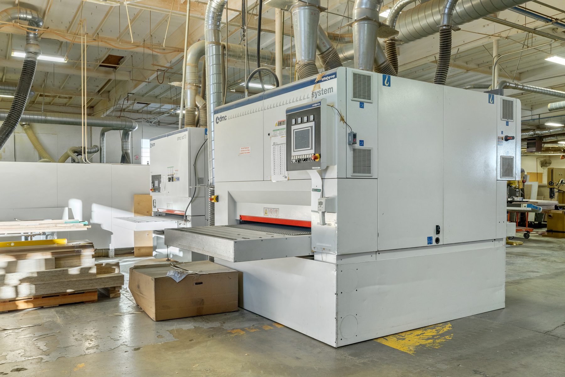 Fine Line's wide-belt sander on the shop floor.