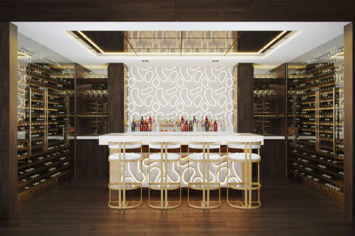 A wine room built by Fine Line: arched racking, a long bar, stools.